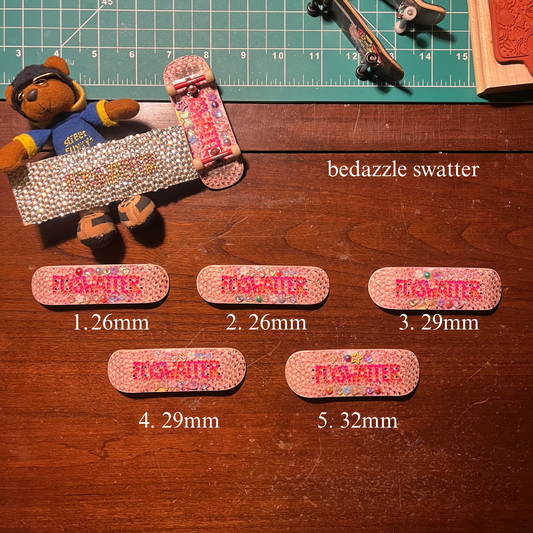 bedazzle swatter (with gem board rails)